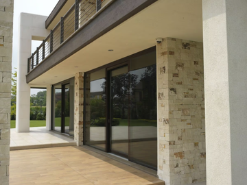 VITRUM 90 - Lift and slide wood and glass patio door by CARMINATI SERRAMENTI - view 3